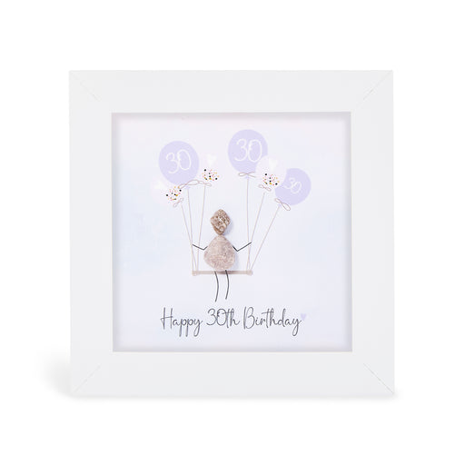 "Happy 30th Birthday" mini plaque, white frame with a pebble figure sitting on a swing holding a bunch of soft lilac balloons