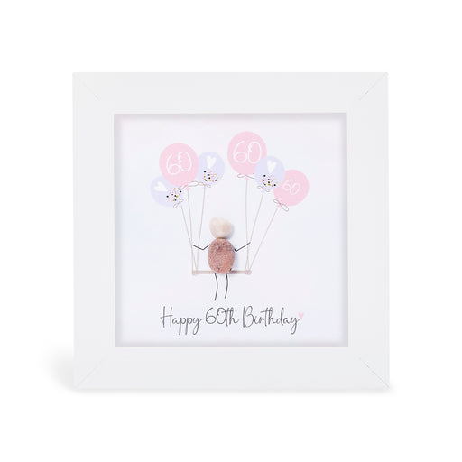 "Happy 60th Birthday" mini plaque, white frame with a pebble figure sitting on a swing holding a bunch of pink and lilac balloons