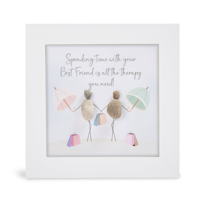 "Spending time with your Best Friend is all the therapy you need!" mini plaque, white frame with two pebble figures holding hands, each with a pastel umbrella and shopping bags