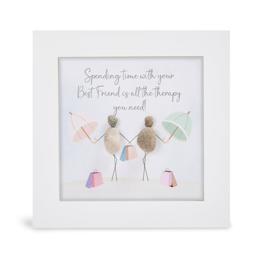 "Spending time with your Best Friend is all the therapy you need!" mini plaque, white frame with two pebble figures holding hands, each with a pastel umbrella and shopping bags