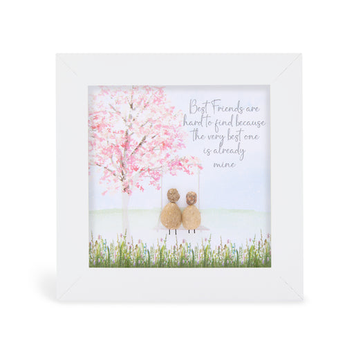 "Best Friends are hard to find because the very best one is already mine" mini plaque, white frame with two pebble figures sitting on a swing beneath a full pink blossom tree with a wildflower meadow border