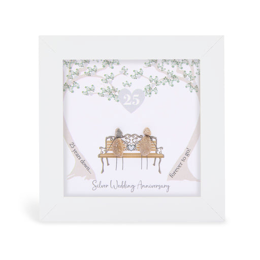 Pebble art framed plaque with two natural pebble figures on an ornate bench beneath a silver tree, a silver heart with the number 25 above them, and the sentiment "25 years down... forever to go! Silver Wedding Anniversary", white frame