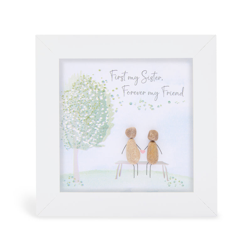 First my Sister, Forever my Friend" mini plaque, white frame with two pebble figures sitting on a bench holding hands beneath an illustrated tree