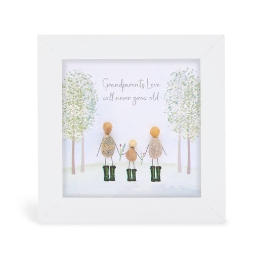 Grandparents Love will never grow old" mini plaque, white frame with pebble figures of two grandparents and a child holding hands in green wellies, illustrated woodland background