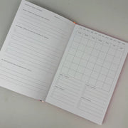 Paper Salad planner open showing monthly spread layout