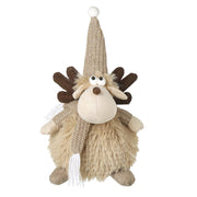 A fluffy fawn sitting moose decoration with dark brown fabric antlers, a tall knitted pompom hat, googly eyes, a brown nose and a knitted scarf with tassels, on a white background