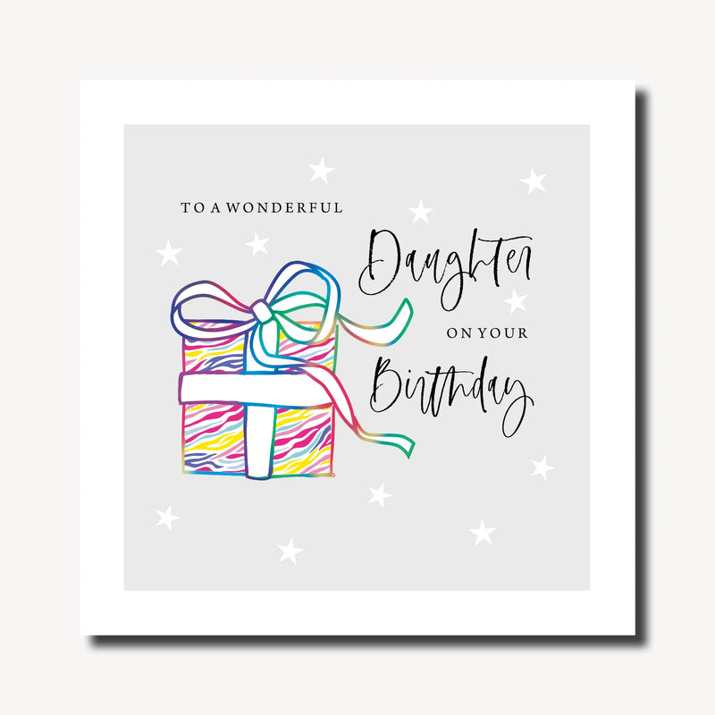 Birthday card for a daughter with a hand-drawn colourful striped gift box with rainbow ribbon bow on a soft grey background with white stars, rainbow foil finish, 210 x 210mm