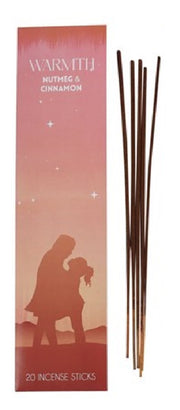Warmth Nutmeg and Cinnamon Incense Sticks, single pack with illustrated couple silhouette and incense sticks, white background