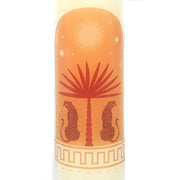 Close-up of Leopard Palm candle wrap featuring illustrated leopards flanking a palm tree with a sunburst and stars on a warm orange background