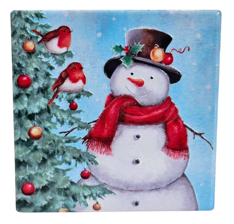 Ceramic Christmas coaster featuring a smiling snowman in a top hat and scarf beside a bauble-decorated Christmas tree with two robins perched among the branches