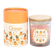 Orange Scented Candle, clear glass jar with wooden lid alongside illustrated cylindrical gift box, white background