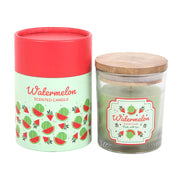 Watermelon Scented Candle, clear glass jar with wooden lid and watermelon label alongside illustrated cylindrical gift box, white background