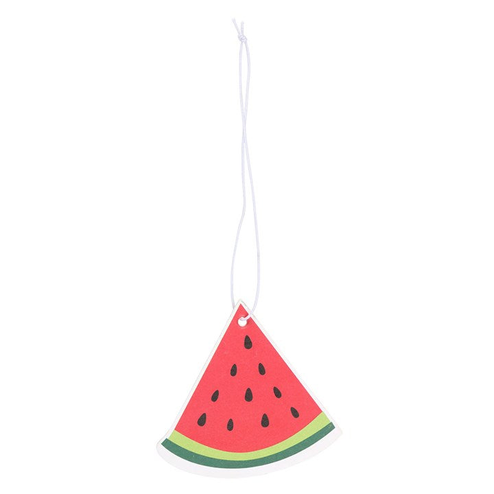 Watermelon slice shaped scented air freshener hanging by its white cord on a white background