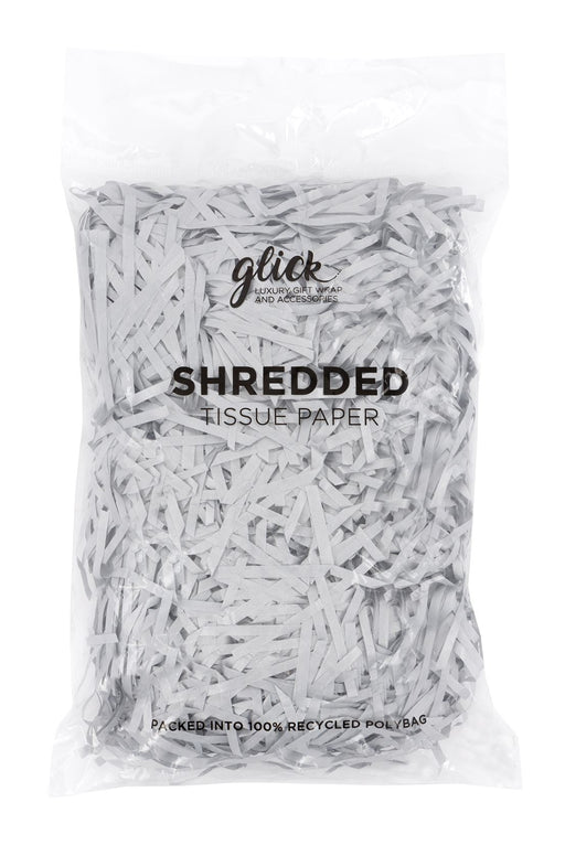 Shredded metallic silver tissue paper in a clear 100% recycled polybag on white background