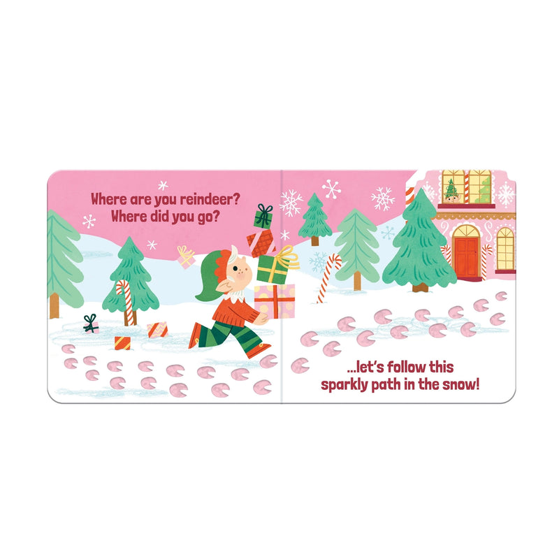 Where Are You Reindeer? board book open spread showing an elf carrying gifts through a snowy scene with a glitter trail of hoof prints to follow