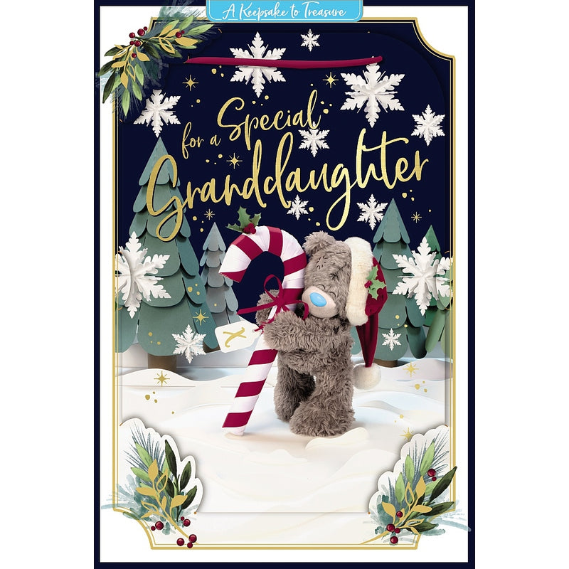 Special Granddaughter 3D-effect Christmas card featuring Tatty Teddy in a Santa hat holding a striped candy cane tied with a bow, surrounded by Christmas trees, snowflakes and festive foliage.