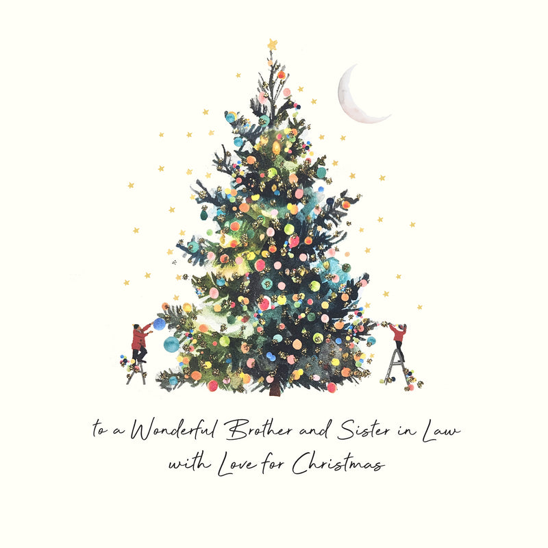 A large illustrated Christmas tree with festive decorations and hand painted glitter, two figures decorating it beneath a crescent moon, on a cream background with the sentiment "to a Wonderful Brother and Sister in Law with Love for Christmas"