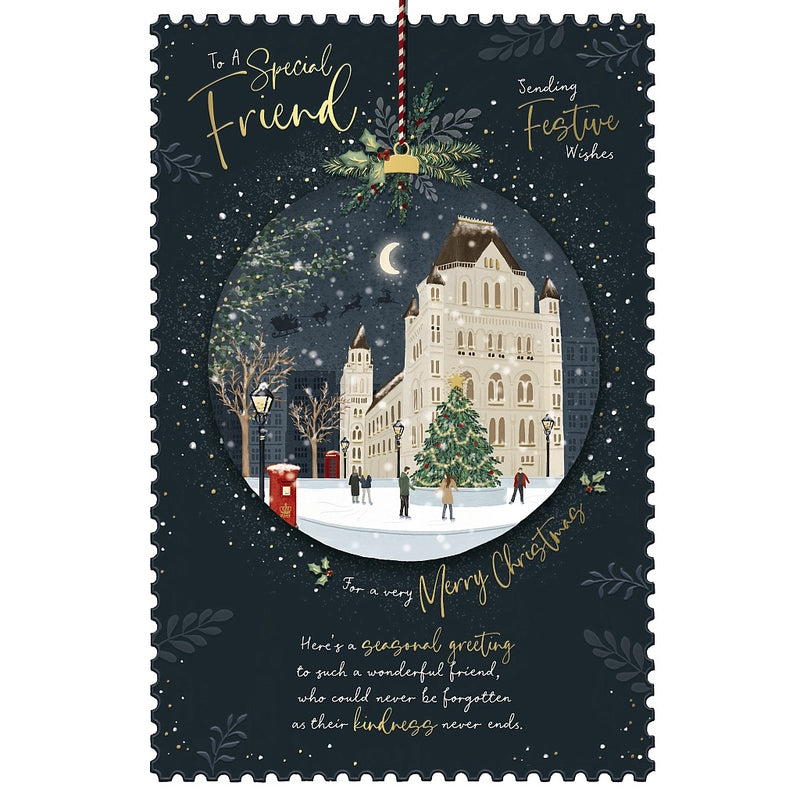 Special Friend Christmas card featuring skaters and a decorated Christmas tree inside a bauble-shaped city scene, with grand buildings, street lamps, a postbox and falling snow