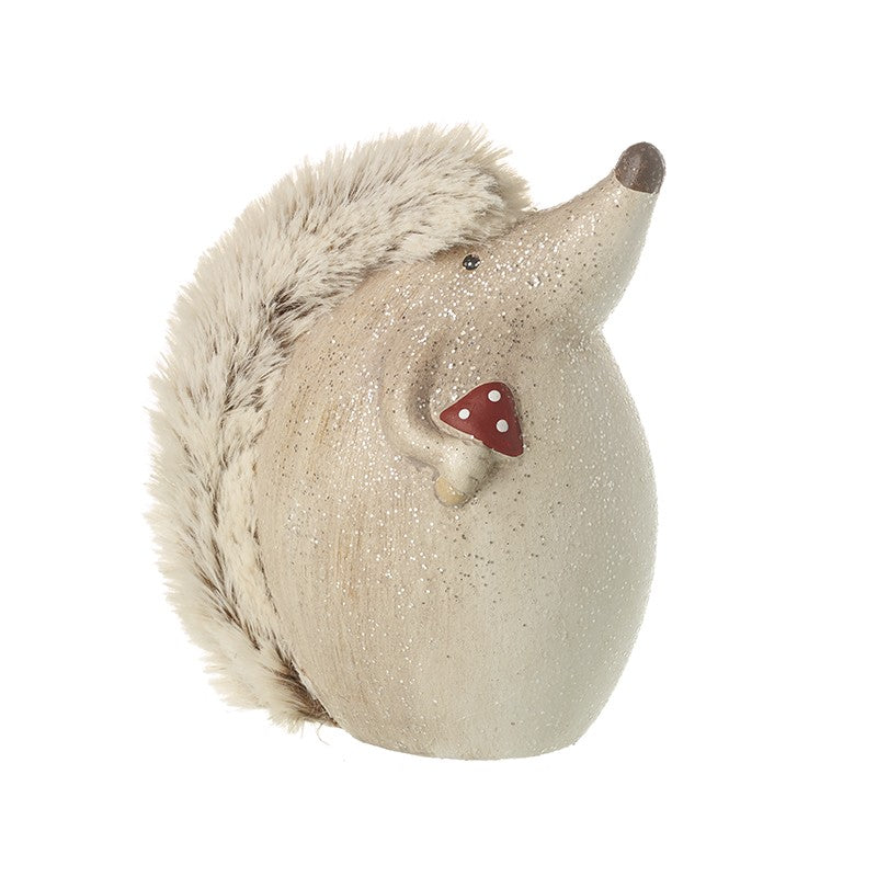 Hedgehog with Toadstool Ornament, glittery cream body with fluffy fur-effect spines, holding a small red toadstool