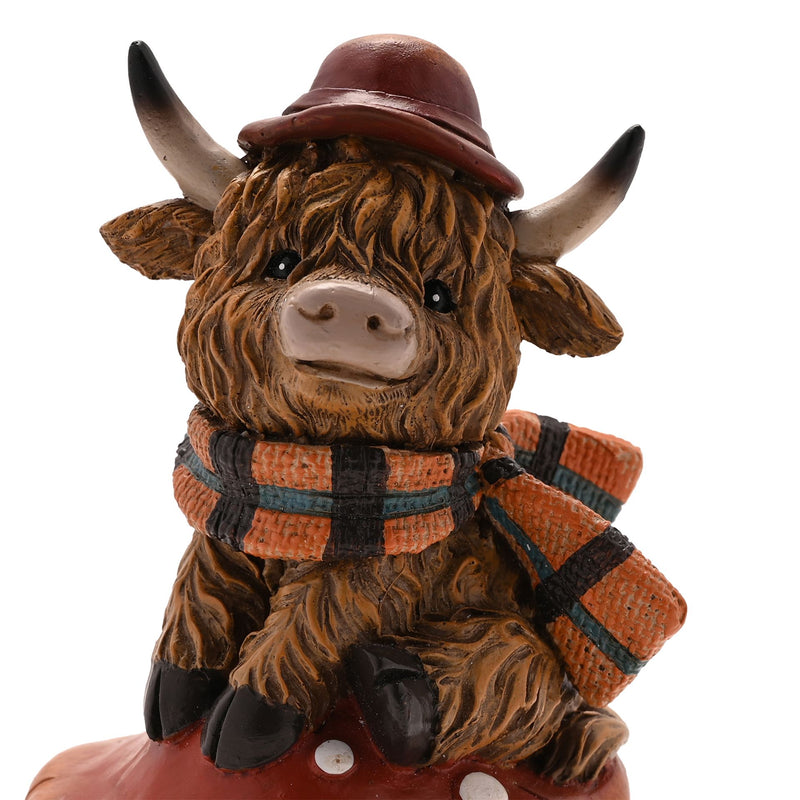 Close-up of Highland cow on mushroom figurine face, detailed shaggy fur, curved horns, bowler hat and orange tartan scarf, white background