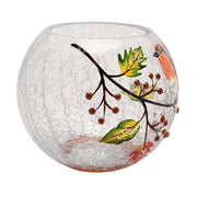 A round crackle glass votive holder with hand-painted berry branch, autumn leaves and a partial view of a robin, side view on a white background