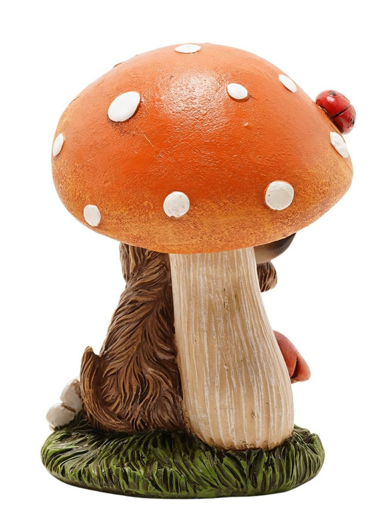 Highland Cow Toadstool Figurine back view showing spotted toadstool cap with ladybird detail and shaggy highland cow fur, on white background