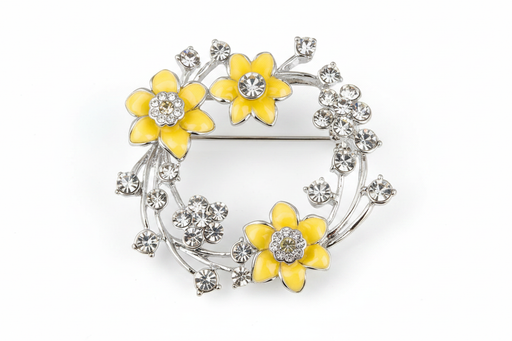 Equilibrium Radiant Daffodil Round Brooch with yellow daffodil flowers and crystal-effect stones on white background