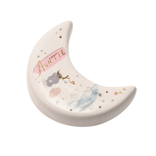 White ceramic crescent moon-shaped keepsake token with gold foil Auntie sentiment and watercolour cloud and floral illustrations, white background