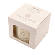 Moments Happy Home candle in gift box with heart-print design and window front, top showing Bergamot Petitgrain and Amber fragrance