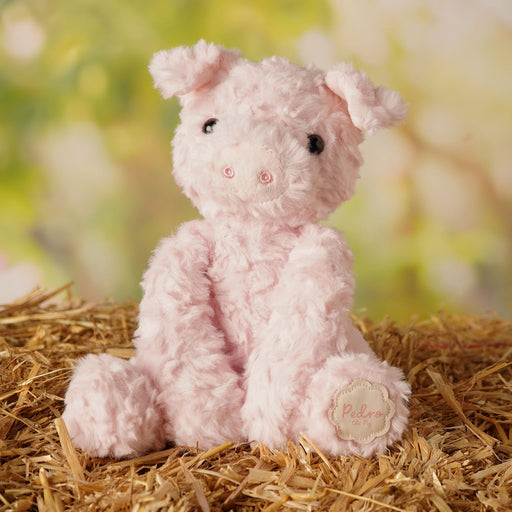 Pedro the plush pig soft toy 23cm, lifestyle shot — a cuddly farmyard companion for animal lovers and little ones