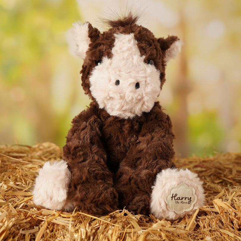 Harry the plush sitting horse soft toy 22cm, lifestyle shot — a cuddly companion for horse lovers and little adventurers