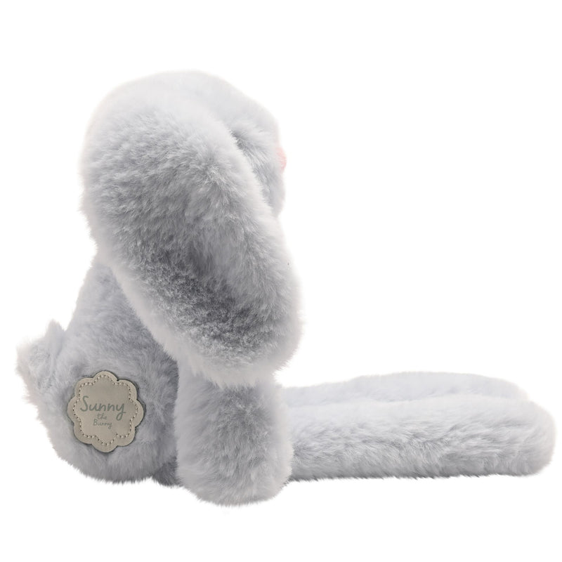 Side view of Sunny plush long leg bunny showing slim profile, long legs, and soft coat with name tag