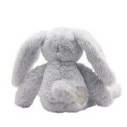 Rear view of Sunny plush bunny toy showing fluffy cotton tail and name tag, 30cm