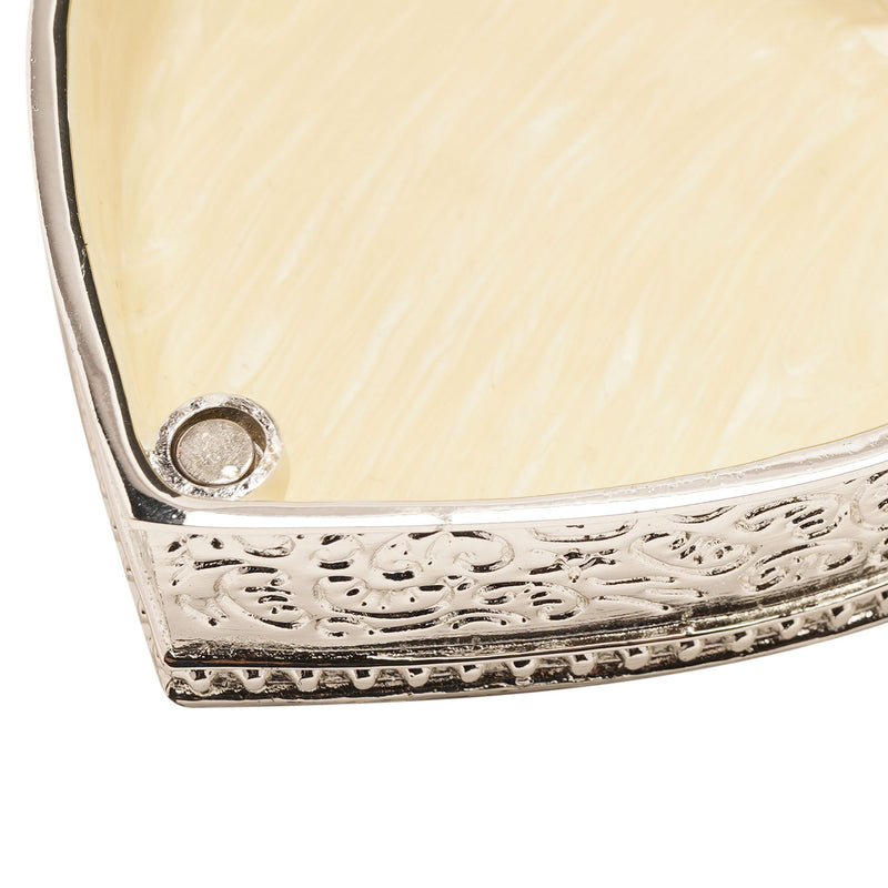 Close-up of Sophia heart trinket box showing cream-lined interior, magnetic closure and embossed floral scroll sides, silver-tone finish, white background