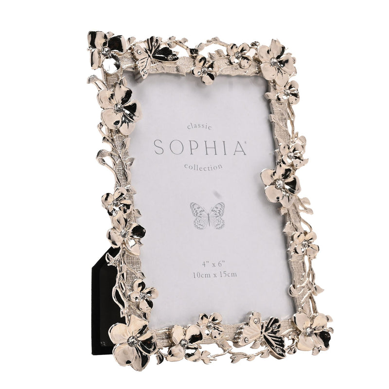 Sophia floral butterfly nickel-plated photo frame, three-quarter view showing ornate border and free-standing velvet backing, white background