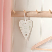  Love Story Mr & Mrs ceramic heart ornament 13cm, lifestyle shot — hanging on a wooden row of hooks