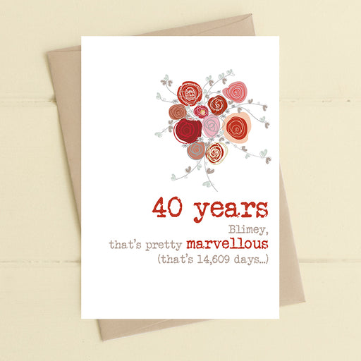 40th ruby wedding anniversary card with an illustrated bouquet of red and pink roses and the message "40 years, blimey, that's pretty marvellous (that's 14,609 days…)"