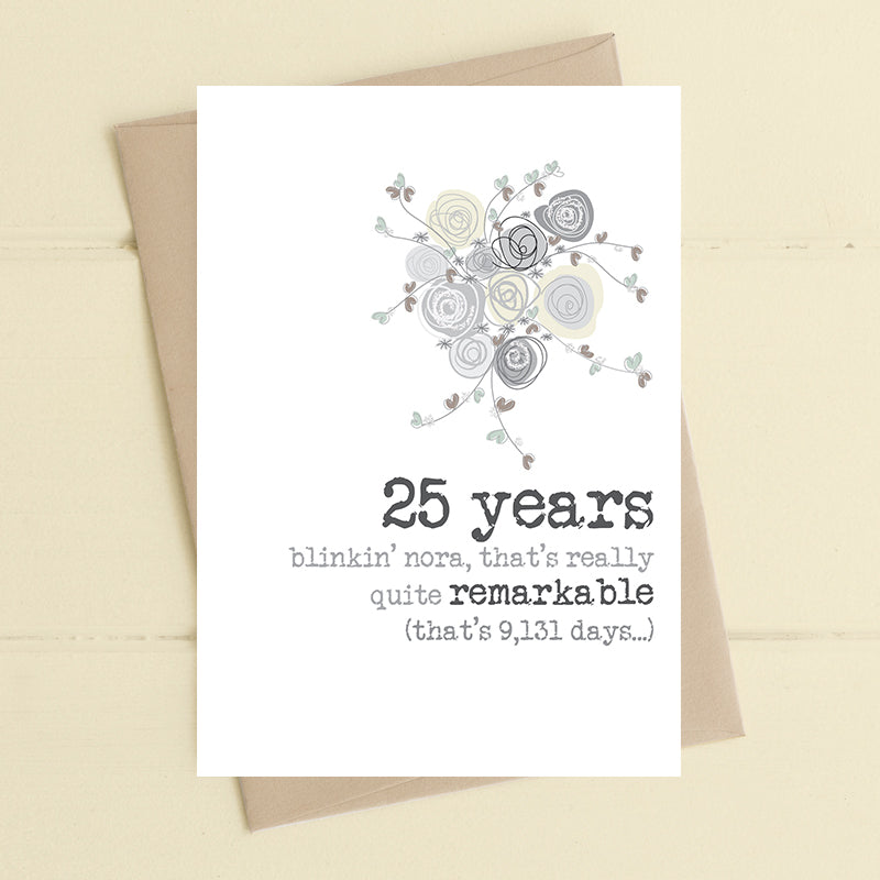 25th wedding anniversary card with an illustrated bouquet of silver roses and the message "25 years, blinkin' nora, that's really quite remarkable (that's 9,131 days…)"